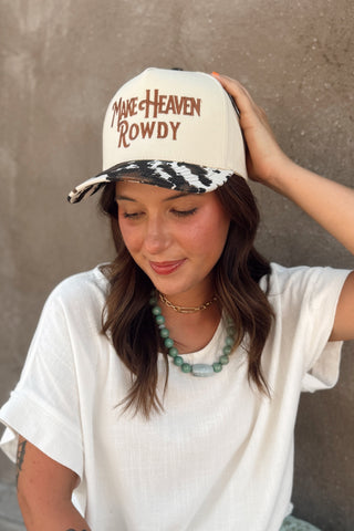 Make Heaven Rowdy Cow Print Trucker Hat
