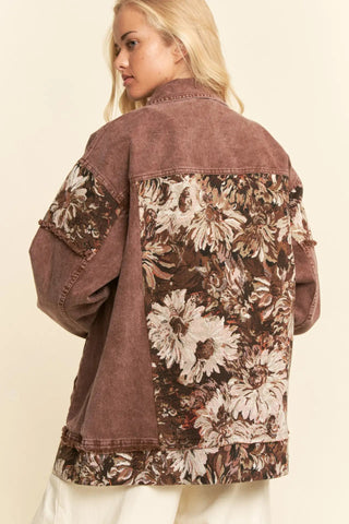 Floral patterned jacket on a plain background