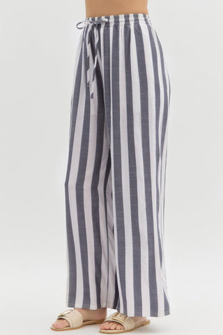 Striped pants with a tie waist on a white background